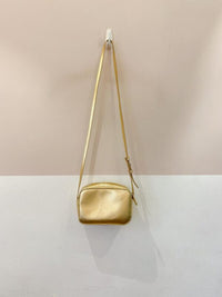 Bolsa couro dourada Schutz