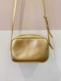 Bolsa couro dourada Schutz