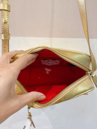 Bolsa couro dourada Schutz