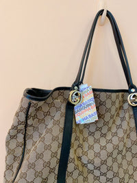 Bolsa sacola monogramada Gucci