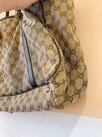 Bolsa sacola monogramada Gucci