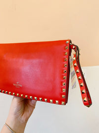 Clutch vermelha spikes Valentino
